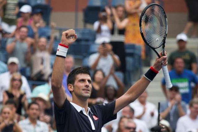 Djokovic of Serbia celebrates after defeating Seppi of Italy in their third round match at the U.S. Open Championships tennis tournament in New York